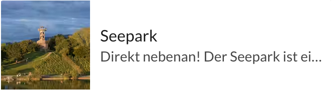15-Meter-Turm im Seepark unter bewölktem Himmel.